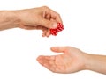 Two red dice being given Royalty Free Stock Photo