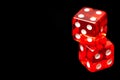 Two red dice on black background Royalty Free Stock Photo