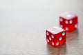 Two Red Dices Isolated on Desktop Royalty Free Stock Photo