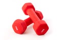 Two red dumbbells on white background Royalty Free Stock Photo