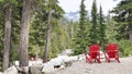 Two red empty chairs in Glacier National Park of Canada. Royalty Free Stock Photo