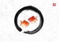 Two red fishes in black enso zen circle on rice paper background. Traditional oriental ink painting sumi-e, u-sin, go Royalty Free Stock Photo