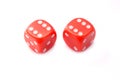 Two red game dice isolated on white Royalty Free Stock Photo