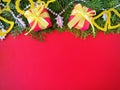 Two red gift boxes with yellow ribbon bow on red background. Royalty Free Stock Photo