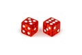 Two red glass dice isolated on white background. Five and six