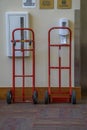 Two Red Hand Trucks Waiting to be of Service Royalty Free Stock Photo