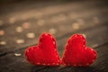 Two red heart with a lot of wooden hearts on wooden background Royalty Free Stock Photo