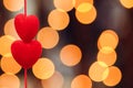 Two red hearts, close-up bokeh evening calm tender background