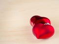 Two Red Hearts Isolated On Wood Background, Concept Of Valentine Day