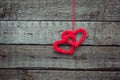 Two red hearts on old shabby wooden background Royalty Free Stock Photo