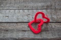 Two red hearts on old shabby wooden background Royalty Free Stock Photo