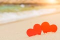 Two red hearts on the summer beach. Royalty Free Stock Photo