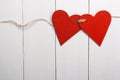 Two red hearts tied together Royalty Free Stock Photo