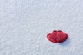two red hearts on white winter snow, free space. Love concept and valentine`s day background Royalty Free Stock Photo