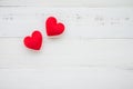 Two red hearts on white wooden background - valentines day concept Royalty Free Stock Photo