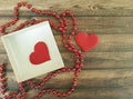 Two red hearts, wooden background, box, romantic, bead