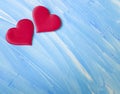 Two red hearts, wooden blue background creative