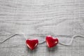 Two red hearts on a wooden shabby background for valentine. Royalty Free Stock Photo