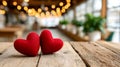 Two red hearts on wooden table Royalty Free Stock Photo