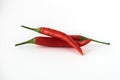 Two red hot chili pepper isolated on the white background. Selective focus. Royalty Free Stock Photo