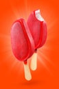 Two red ice cream popsicle isolated