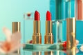 Two red lipsticks in a gold containers Royalty Free Stock Photo