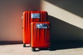 Two red luggages with protective masks