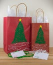 Two red paper gift bags decorated for Christmas Royalty Free Stock Photo