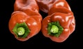 Two red paprika fronts Royalty Free Stock Photo