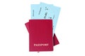 Two red passports, blue flight boarding pass, ticket white background isolated closeup top view, airplane travel, check in control
