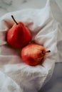 Two Red Pears in White Napkin Royalty Free Stock Photo