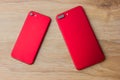 Two red phones on the desk. Royalty Free Stock Photo