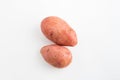 Two red potatoes on a white background Royalty Free Stock Photo