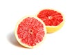 Two red ripe grapefruit slices on white isolated background Royalty Free Stock Photo