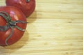 Two red ripe tomatoes on wooden cutting board Royalty Free Stock Photo