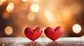 Two red sparkling hearts against the mysterious festive background with bokeh effect. Concept of Valentine's Day Royalty Free Stock Photo