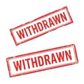 Two red stamp marks showing the word withdrawn isolated on white background Royalty Free Stock Photo