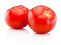 Two red tomatoes isolated on white background Royalty Free Stock Photo