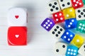 Two red and white Valentines Day dice apart from others