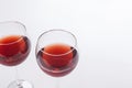 Two red wine glass on white background. Royalty Free Stock Photo