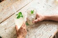 Two drinks in glasses with white straws and mint Royalty Free Stock Photo