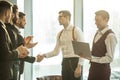 Business partners shaking hands in office Royalty Free Stock Photo