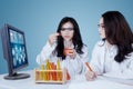 Two researchers doing experiments in the lab Royalty Free Stock Photo