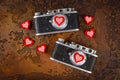 Two retro camera and hearts Royalty Free Stock Photo