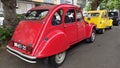 19.03.2023 Two retro cars of the French brand Citroen 2CV red and yellow in Lisbon Royalty Free Stock Photo