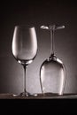 two reversed empty wineglasses