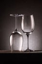 two reversed empty wineglasses