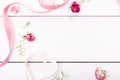 Two ribbon magic hearts on wooden backround, Valentine day concept Royalty Free Stock Photo