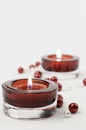 Two rich red candle holder and pearls. Royalty Free Stock Photo