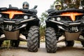 Two riders on quad bikes, front view, closeup Royalty Free Stock Photo